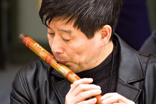 A transverse bamboo flute used in a jiang shu ensemble